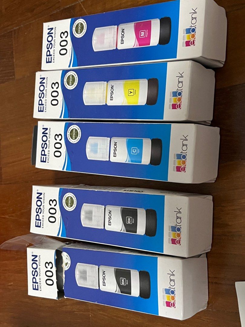 Epson L3250 EcoTank Printer with extra ink cartridges and papers454846412164976642