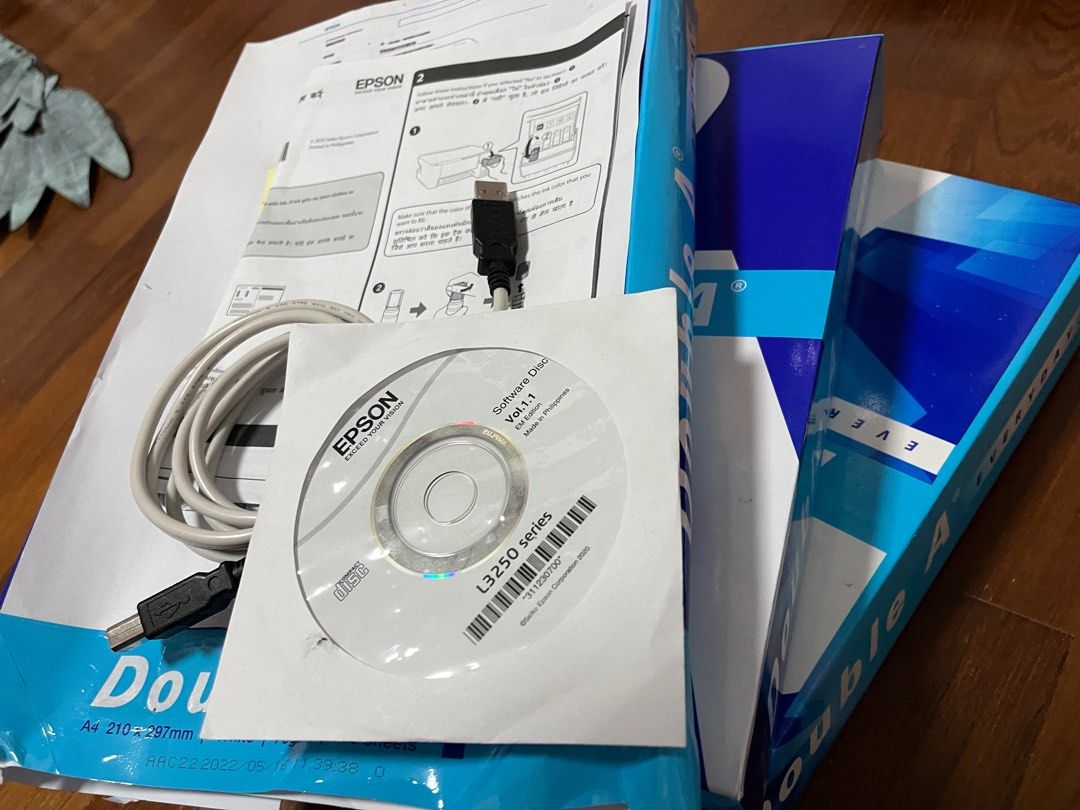 Epson L3250 EcoTank Printer with extra ink cartridges and papers454846412164976643