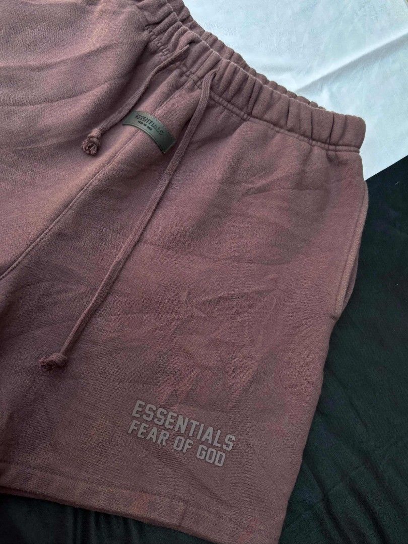 Fear of God Essentials Shorts (Category: Shorts) located in Cagayan de Oro. Submitted by aj_finds22 (Listing ID 1437993511, Image 2). Description: - Fear of God Essentials shorts 30x18 EXCELLENT CONDI,LIKE NEW NO ISSUE EMBOSSED LOGO, NO CRACK ON LOGO - Color: Brown - Size: L - Features the Essentials logo - Drawstring waistband - Includes pockets - Made with soft material.