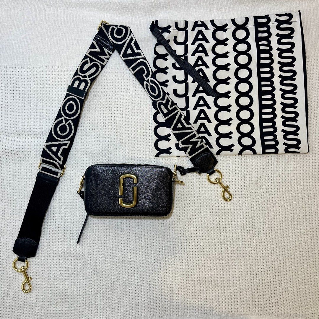 [Free Shipping] Marc Jacobs Snapshot Small Camera Bag - Black/Multi (Category: Luxury Bags & Wallets) located in Mariveles. Submitted by hemsandgems (Listing ID 1437983478, Image 1). Description: Selling for almost half the SRP. Negotiable within reason. No lowballing please! See last two photos for flaws 7in × 4in × 2 in - Brand new; never used - Includes original dust bag - Gold hardware - Saffiano leather - YKK zippers (7th photo) - Made in Vi