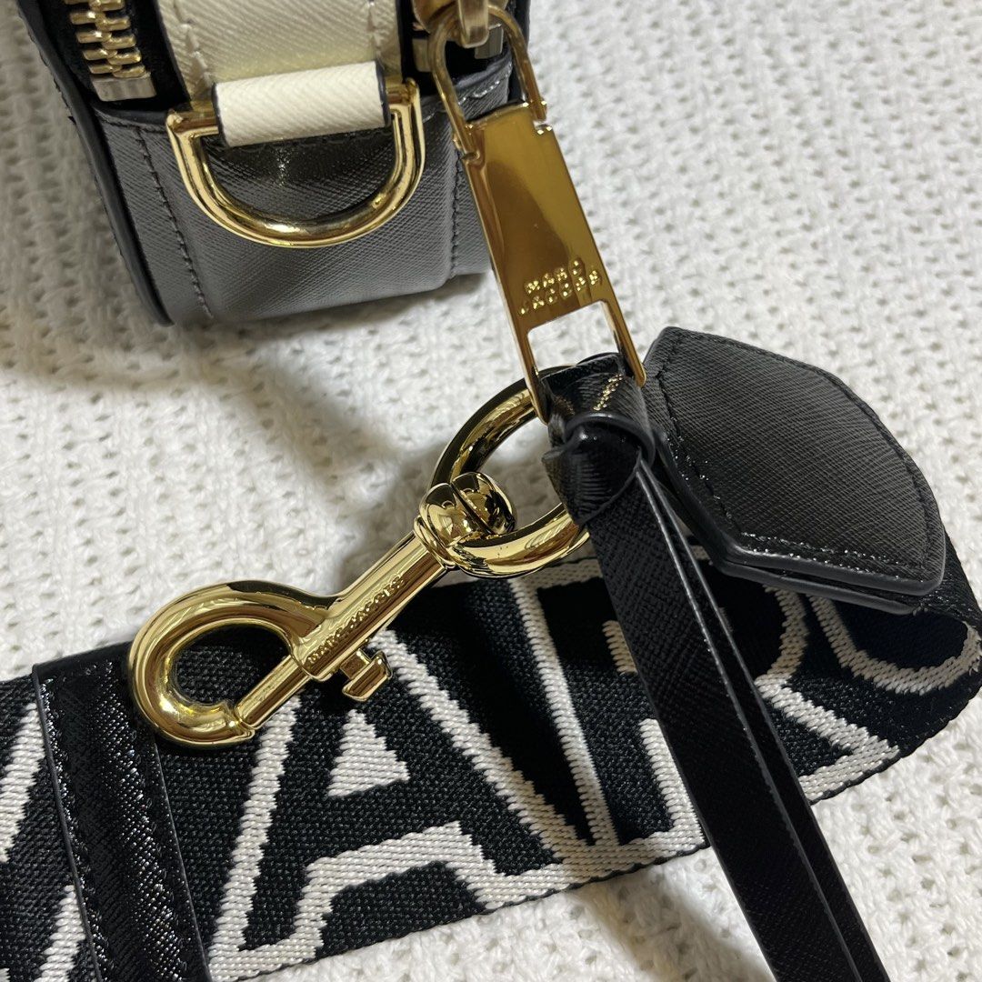 [Free Shipping] Marc Jacobs Snapshot Small Camera Bag - Black/Multi (Category: Luxury Bags & Wallets) located in Mariveles. Submitted by hemsandgems (Listing ID 1437983478, Image 3). Description: Selling for almost half the SRP. Negotiable within reason. No lowballing please! See last two photos for flaws 7in × 4in × 2 in - Brand new; never used - Includes original dust bag - Gold hardware - Saffiano leather - YKK zippers (7th photo) - Made in Vi