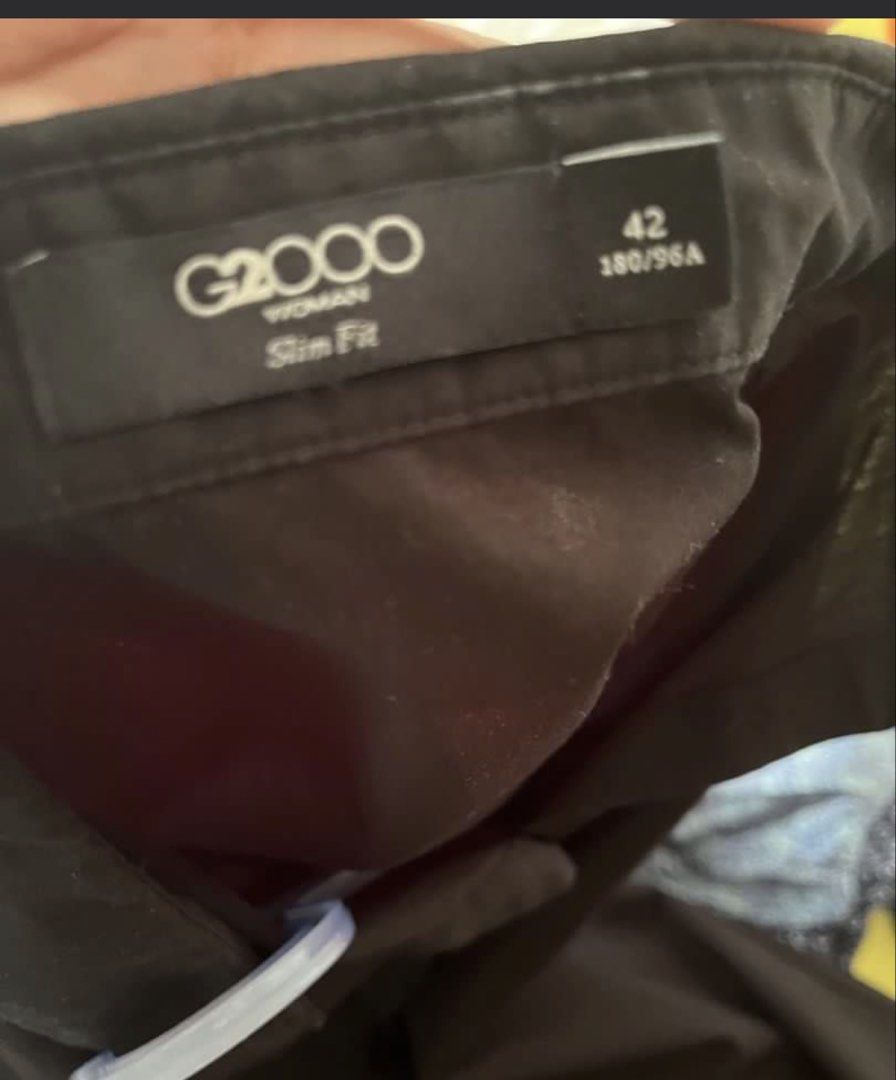 G2000 Woman Black Blouse Size 42 (Category: Blouses) located in Paranaque City. Submitted by richezlremo6165 (Listing ID 1438109821, Image 3). Description: - G2000 Woman black blouse - Size: 42 - Features: Short, puffed sleeves; button-down front; collared neckline - Fit: Slim - Condition: Good.