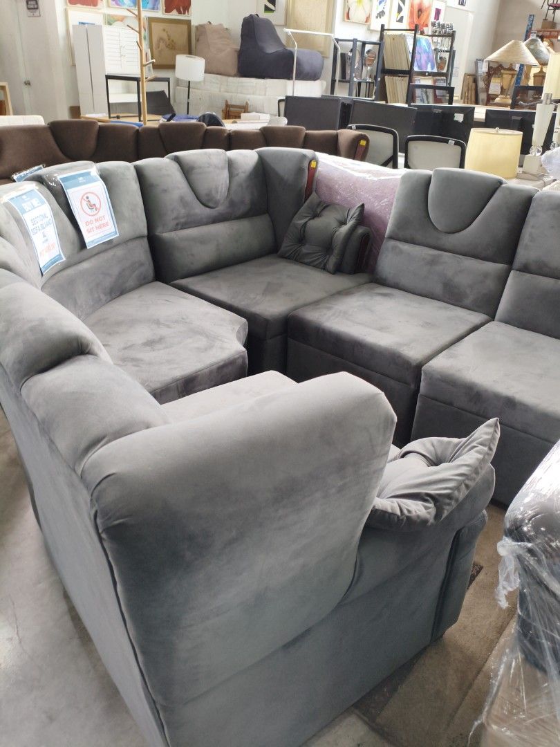 Gray Sectional Sofa (Category: Sofas) located in Manila. Submitted by hmrgrace5. (Listing ID 1437970051, Image 3). Description: - Stylish gray sectional sofa - Comfortable design with multiple sections - Soft, velvety texture - Modern aesthetic - Includes a matching pillow - Perfect for living rooms and lounges.