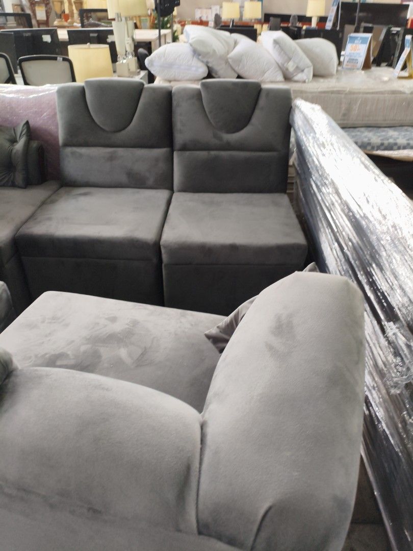 Gray Sectional Sofa (Category: Sofas) located in Manila. Submitted by hmrgrace5. (Listing ID 1437970051, Image 2). Description: - Stylish gray sectional sofa - Comfortable design with multiple sections - Soft, velvety texture - Modern aesthetic - Includes a matching pillow - Perfect for living rooms and lounges.