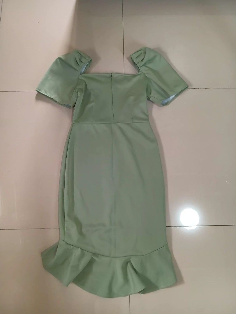 Green Dress with Ruffle Sleeves (Category: Dresses) located in Manila. Submitted by iyareole (Listing ID 1437978124, Image 2). Description: SIZE: SMALL TO MEDIUM ORIG PRICE: 549 - Green dress - Sweetheart neckline - Ruffle sleeves - Fitted bodice - Flared hem - Back zipper closure - Perfect for special occasions - Smooth, woven fabric.