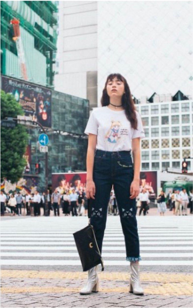 GU x Sailor Moon Luna Jeans (Category: Jeans) located in Cavite. Submitted by yakultjeni85475 (Listing ID 1438091740, Image 1). Description: - GU x Sailor Moon collaboration jeans - Dark wash denim - Straight leg fit - Raw hem - Embroidered Luna cat faces on the knees - Sailor Moon Luna logo embroidered on front pocket.