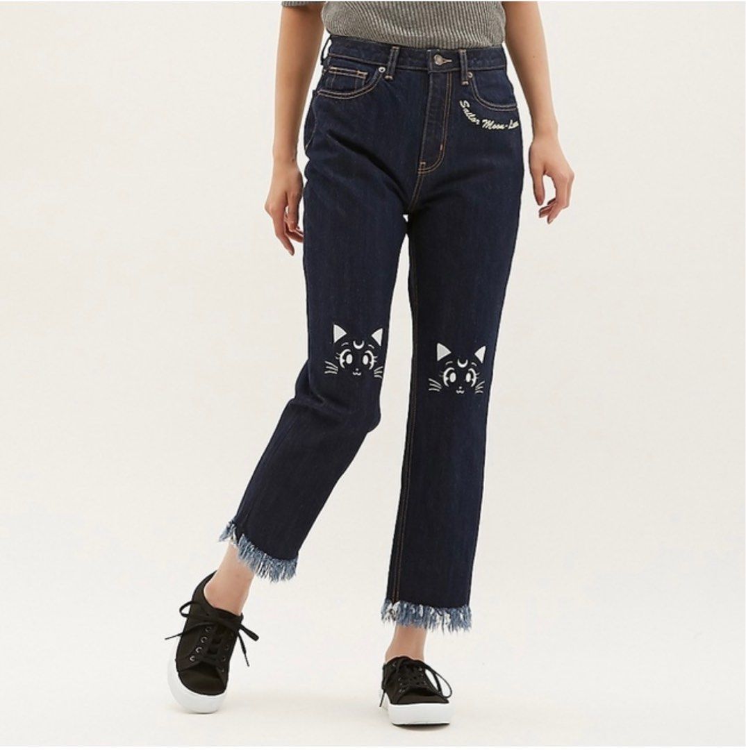 GU x Sailor Moon Luna Jeans (Category: Jeans) located in Cavite. Submitted by yakultjeni85475 (Listing ID 1438091740, Image 2). Description: - GU x Sailor Moon collaboration jeans - Dark wash denim - Straight leg fit - Raw hem - Embroidered Luna cat faces on the knees - Sailor Moon Luna logo embroidered on front pocket.