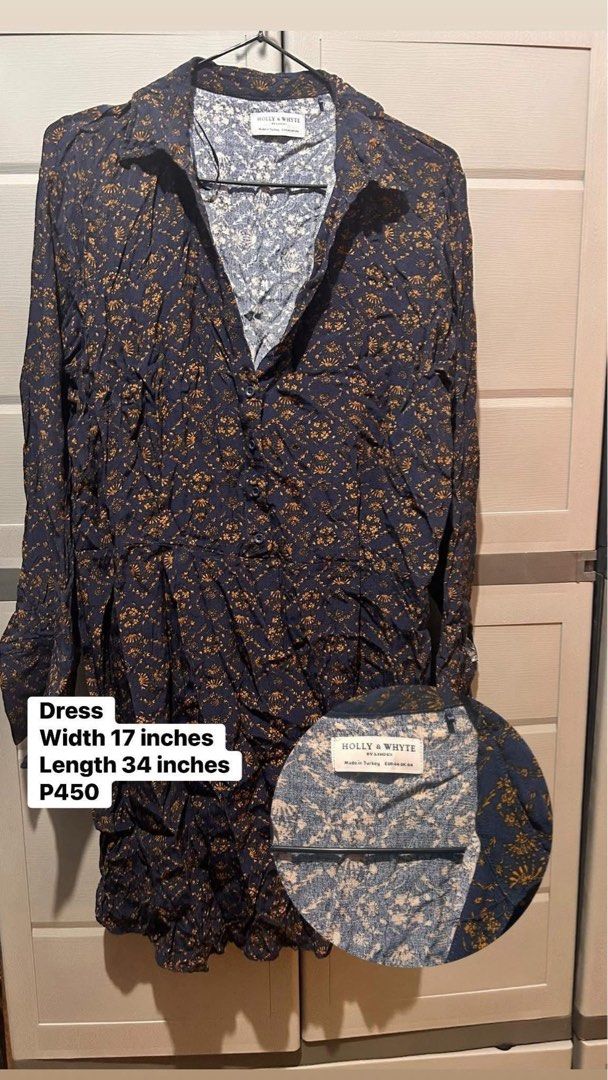 Holly & Whyte Floral Dress (Category: Dresses) located in Manila. Submitted by corryyy (Listing ID 1438050662, Image 1). Description: - Brand: Holly & Whyte - Navy blue floral dress - Collared neckline - Long sleeves - Measurements: - Width: 17 inches - Length: 34 inches - Price: P450.