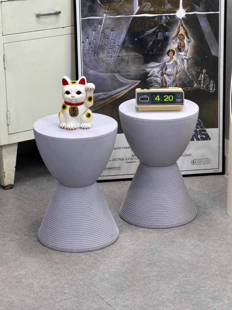 Hourglass Side Table (Category: Tables & Sets) located in Valenzuela. Submitted by upcycle_things (Listing ID 1438015132, Image 2). Description: - Stylish side table - Hourglass shape - Light grey color - Textured base - Flat top surface - Perfect for decor or bedside use - Ideal for small spaces.