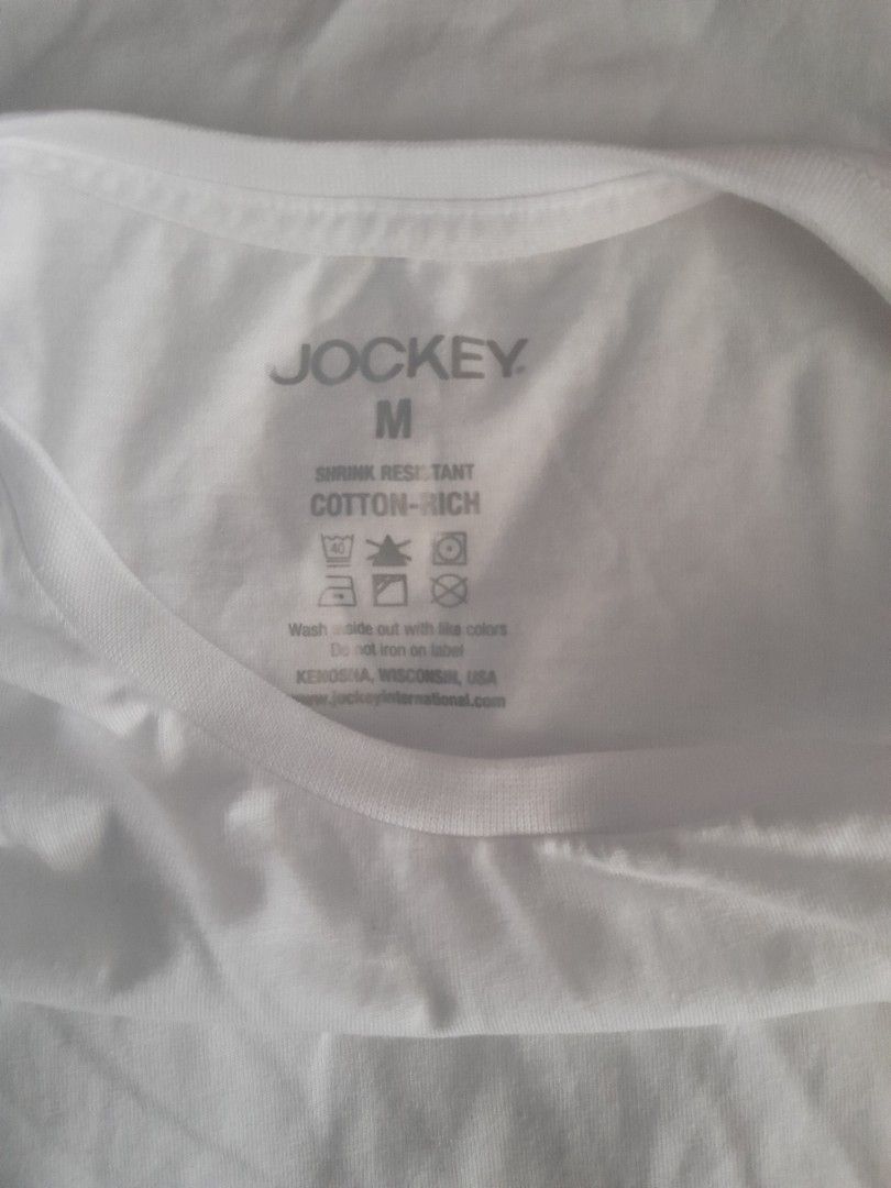 Jockey White T-shirt (Category: Shirts) located in Manila. Submitted by hello.sherry (Listing ID 1437978667, Image 2). Description: - White Jockey t-shirt - Size: Medium - Classic crew neck - Short sleeves - Comfortable cotton-rich material - Made in the USA - Easy care: Machine wash and tumble dry Note: I bought the wrong size New on Carousell but 100% legit seller I am currently decluttering my personal wardrobe and disposing of pre-loved cloth