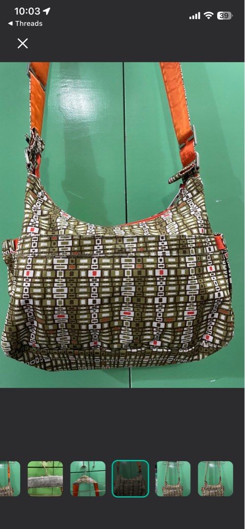 Jujube bag (Category: Diaper Bags & Wetbags) located in Quezon City. Submitted by OtheliaFinds (Listing ID 1438072140, Image 3). Description: This is the ultimate "everything" bag. While designed as baby or pedia visit bag. Its messenger silhouette makes it also perfect for students, commuters, or anyone who loves a high-functioning bag with a fun, vintage aesthetic. The magnetic closures on the front flap allow for silent, easy access. • Dimensi