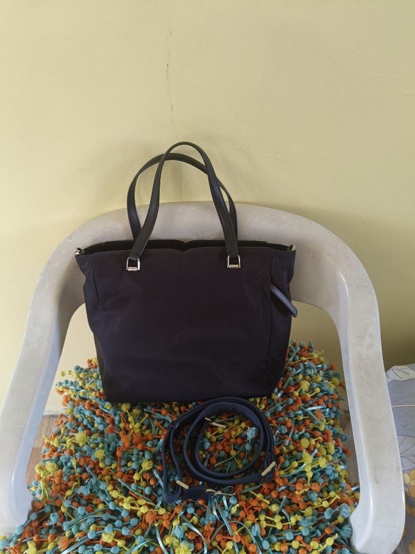 Kate Spade Nylon two way bag (Category: Luxury Bags & Wallets) located in Dasmarinas. Submitted by jliskenzo (Listing ID 1437965881, Image 2). Description: in good used condition seldom used no flaw authentic 9" height x 11" width adjustable sling top leather handle 5.5" approx.