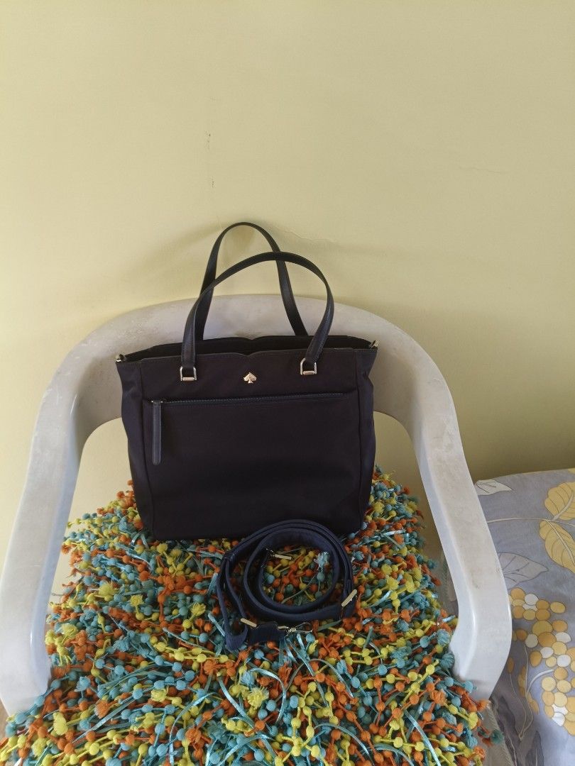 Kate Spade Nylon two way bag (Category: Luxury Bags & Wallets) located in Dasmarinas. Submitted by jliskenzo (Listing ID 1437965881, Image 1). Description: in good used condition seldom used no flaw authentic 9" height x 11" width adjustable sling top leather handle 5.5" approx.