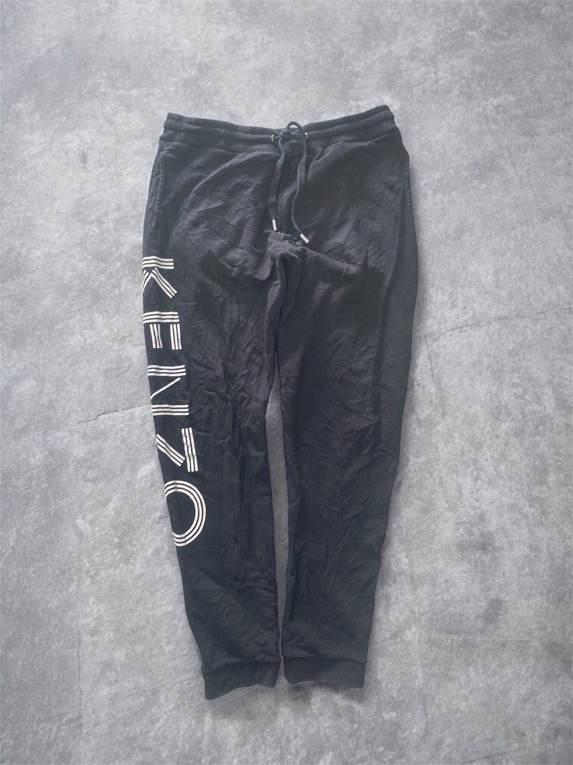 Kenzo Paris Sweatpants XL (Category: Joggers) located in General Trias. Submitted by mangu_ukay (Listing ID 1437960824, Image 2). Description: - Kenzo Paris sweatpants - Size: XL - Features: Drawstring waistband - Fit: Relaxed - Material: Soft, comfortable fabric - Made in Portugal - Perfect for casual wear.