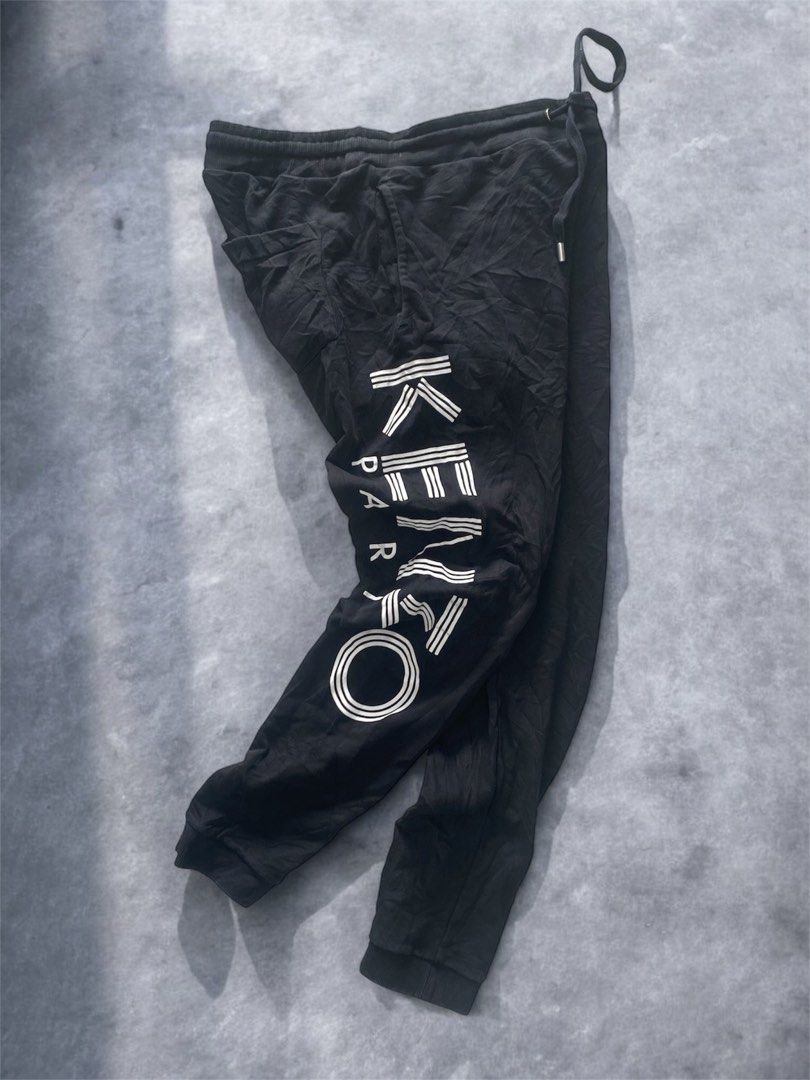 Kenzo Paris Sweatpants XL (Category: Joggers) located in General Trias. Submitted by mangu_ukay (Listing ID 1437960824, Image 1). Description: - Kenzo Paris sweatpants - Size: XL - Features: Drawstring waistband - Fit: Relaxed - Material: Soft, comfortable fabric - Made in Portugal - Perfect for casual wear.