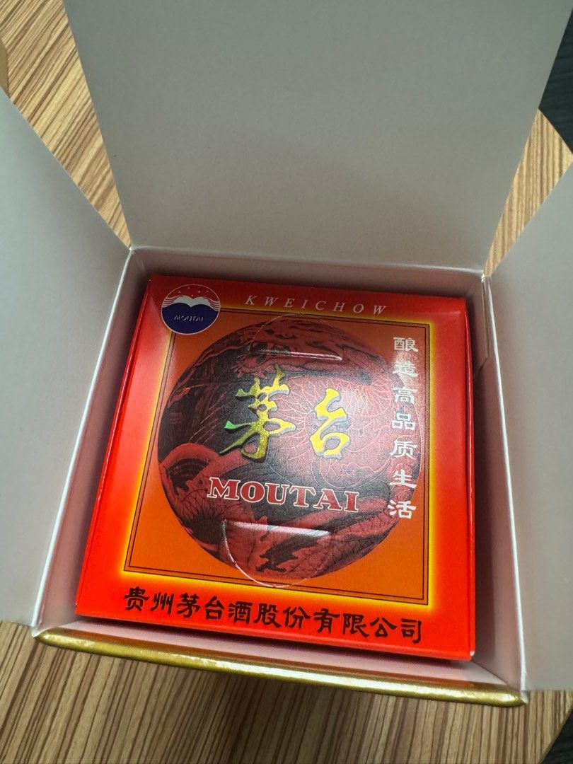 Kweichow Moutai 53% Vol (Category: Beverages) located in Quezon City. Submitted by annsapp (Listing ID 1438041651, Image 2). Description: - Genuine Kweichow Moutai liquor. - Bottle features a red seal and a red ribbon. - Presented in a striking red and gold box. - Box prominently displays the brand name. - 53% Alcohol by Volume (Vol). - Includes a smaller box with the glasses - 2 bottles available.