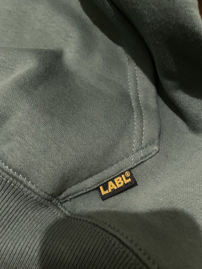LABL Green Hoodie - Size M (Category: Hoodies) located in Paranaque City. Submitted by uuuuugn1hc.18181818 (Listing ID 1438041792, Image 3). Description: - Green LABL hoodie - Yellow logo - Size: M - Features: Hood with drawstrings, front pocket - Brand logo on lower front and tag - Print: 'Living a Balanced Life'.