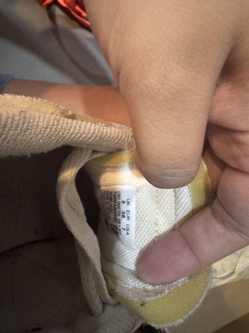 Lacoste cream casual shoes (Category: Sneakers) located in Calamba. Submitted by nanamatheo01 (Listing ID 1437967655, Image 2). Description: - Cream-colored lacoste sneakers - Size: EUR 38, UK 5, USA 7 - Textile upper - Includes original box - Lace-up closure Rfs: decluttering Loc: calamba laguna Issue: natambak na sya needs clean up. Nagcrack rin yung isang logo sa tongue nung shoes selling it low, pero intact naman. kayo na po palinis.