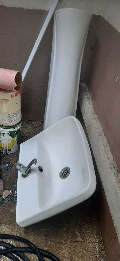 Lavatory with faucet and stand (Category: Bathroom & Kitchen Fixtures) located in Cainta. Submitted by mysticmountain.f41a31 (Listing ID 1437957403, Image 2). Description: white ceramic lavatory with faucet and stand to cover the drain, size is 45cm X 42cm.Like new because we change our bathroom fixtures..