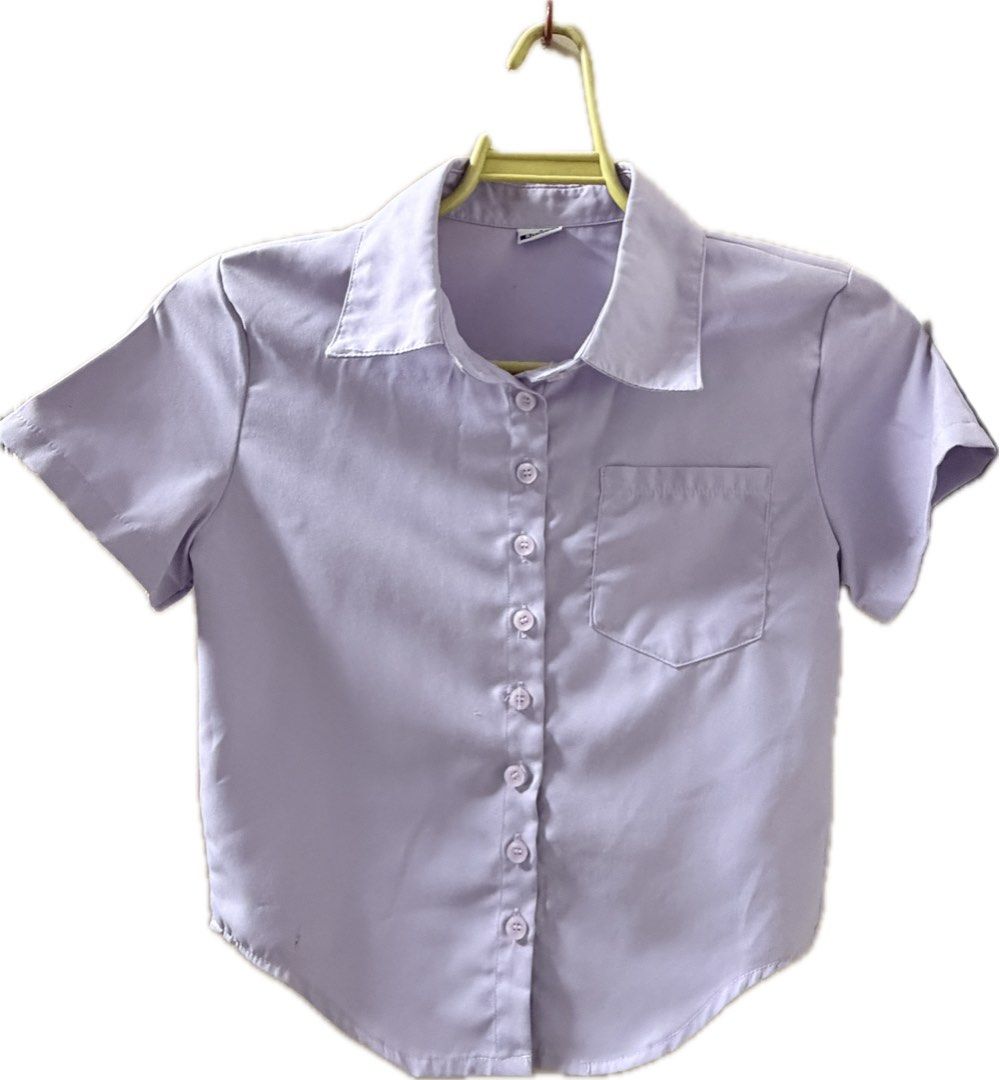 Lavender Short-Sleeved Buttoned Corset-like Collared Top (Category: Others Tops) located in Meycauayan. Submitted by _cbear (Listing ID 1438010134, Image 1). Description: - Lavender short-sleeved blouse - Collared neckline - Single pocket - Button-down closure - Smooth fabric - Corset-like hem - XS to S - Worn once - Glossy Lavender Buttons.