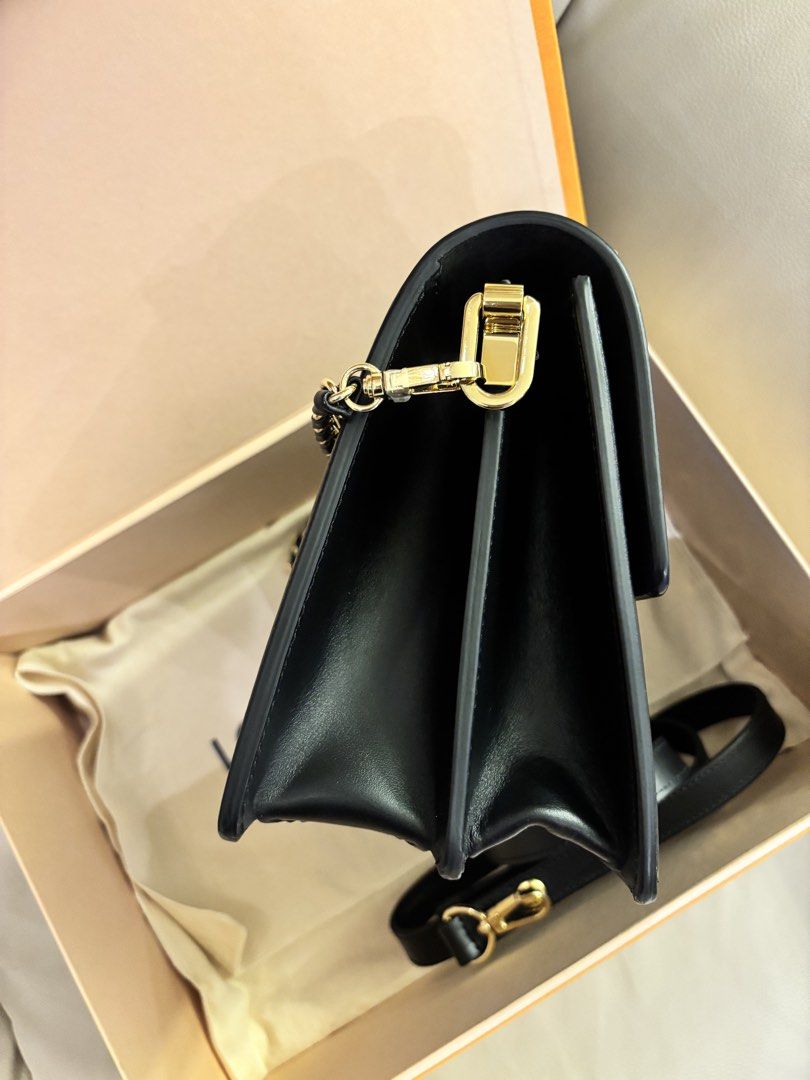 Louis Vuitton Dauphine MM Epi (Category: Luxury Bags & Wallets) located in Santa Rosa. Submitted by authentic.finds.only (Listing ID 1438048584, Image 2). Description: Brand new store price is 262,000 Louis Vuitton Dauphine MM in Black Epi Leather with Gold Hardware. Excellent pre-loved condition with minor superficial nail scratch inside. Exterior is clean and structured, with very minimal signs of wear Includes adjustable/removable strap for sh