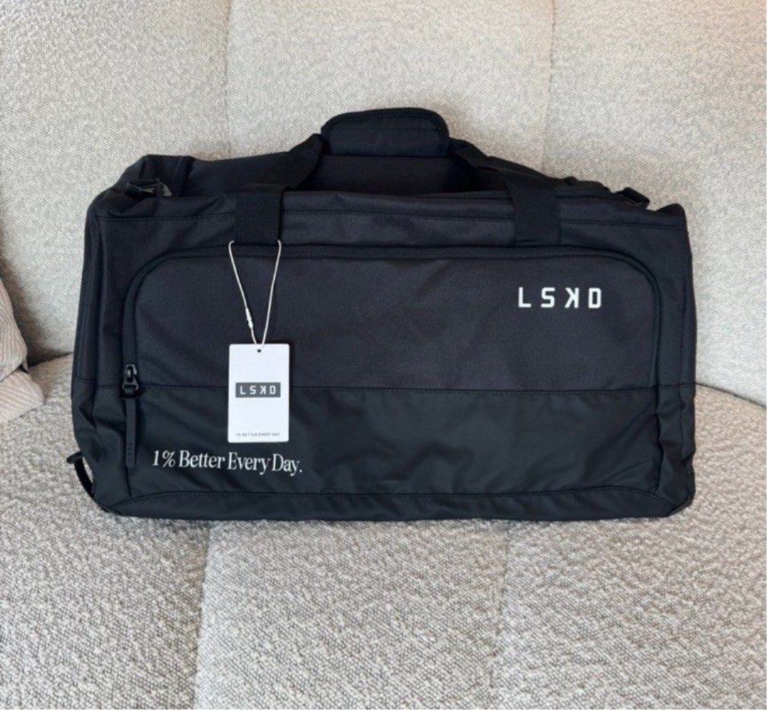LSKD 1% Better Duffle Bag - Black (Category: Sling Bags) located in Manila. Submitted by sbm_declutters (Listing ID 1437990990, Image 2). Description: Retails for 80 USD ~ 4,900 - LSKD duffle bag - Ideal for gym or travel - Color: Black - Features "1% Better Every Day" print - LSKD logo on front - Spacious main compartment - Side pocket for extra storage - Detachable shoulder strap - Includes original tag.