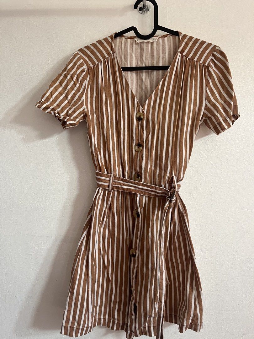 Mango Striped Dress with Belt (Category: Dresses) located in Mandaluyong City. Submitted by declutterrie (Listing ID 1438074073, Image 3). Description: - Brown and white striped pattern - Short sleeves - V-neckline with button closures - Includes matching belt - Size: EUR 32, US 2 - Made in India.