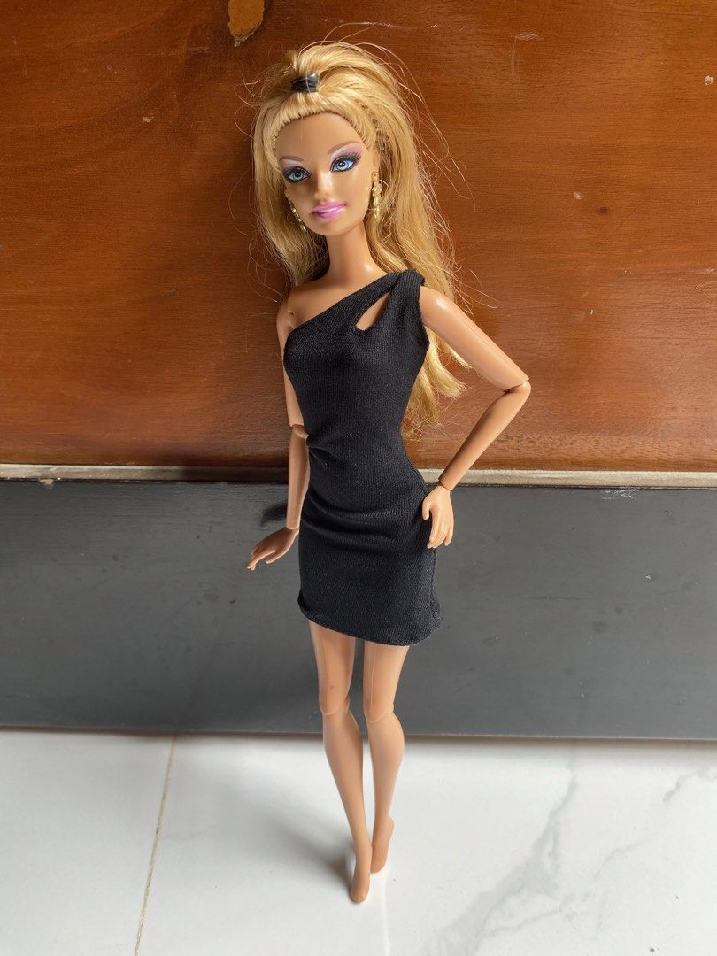 Mattel Barbie Basics Model No. 06 black dress (Category: Dresses) located in San Pablo. Submitted by c4ndy_atax1a (Listing ID 1437952821, Image 2). Description: PM ME FOR BIDDING Mattel Barbie Basics Model No. 06 black dress [Original, came from the doll. No Flaws.] SB : ₱300 MIN INCREMENT : ₱50 DEADLINE FOR BIDDING : Sunday (May 17) at 7PM * Payment first (within 24 hours only, failure to pay = 2nd highest bidder will get the deal, and so on.) *