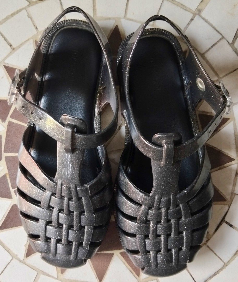 Melissa Sparkle Jelly Sandals (Category: Babies & Kids Fashion) located in Quezon City. Submitted by heybailey (Listing ID 1437950905, Image 3). Description: - Melissa jelly sandals - Sparkly woven design - Adjustable ankle straps with clear buckles - Dark, glittery color - Black soles.