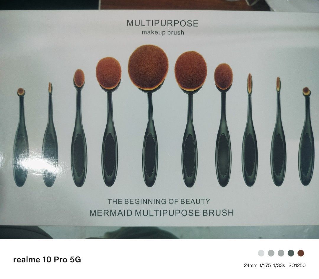 Mermaid Multipurpose Makeup Brush Set (Category: Makeup) located in Manila. Submitted by cleverturtle-2982 (Listing ID 1438038538, Image 3). Description: - 10-piece makeup brush set - Soft, oval-shaped brush heads - Black handles - Creates a smooth, uniform makeup effect - Comes in a white box with 'Mermaid Multipurpose Brush' printed on it - Inspired by the beauty of mermaids.