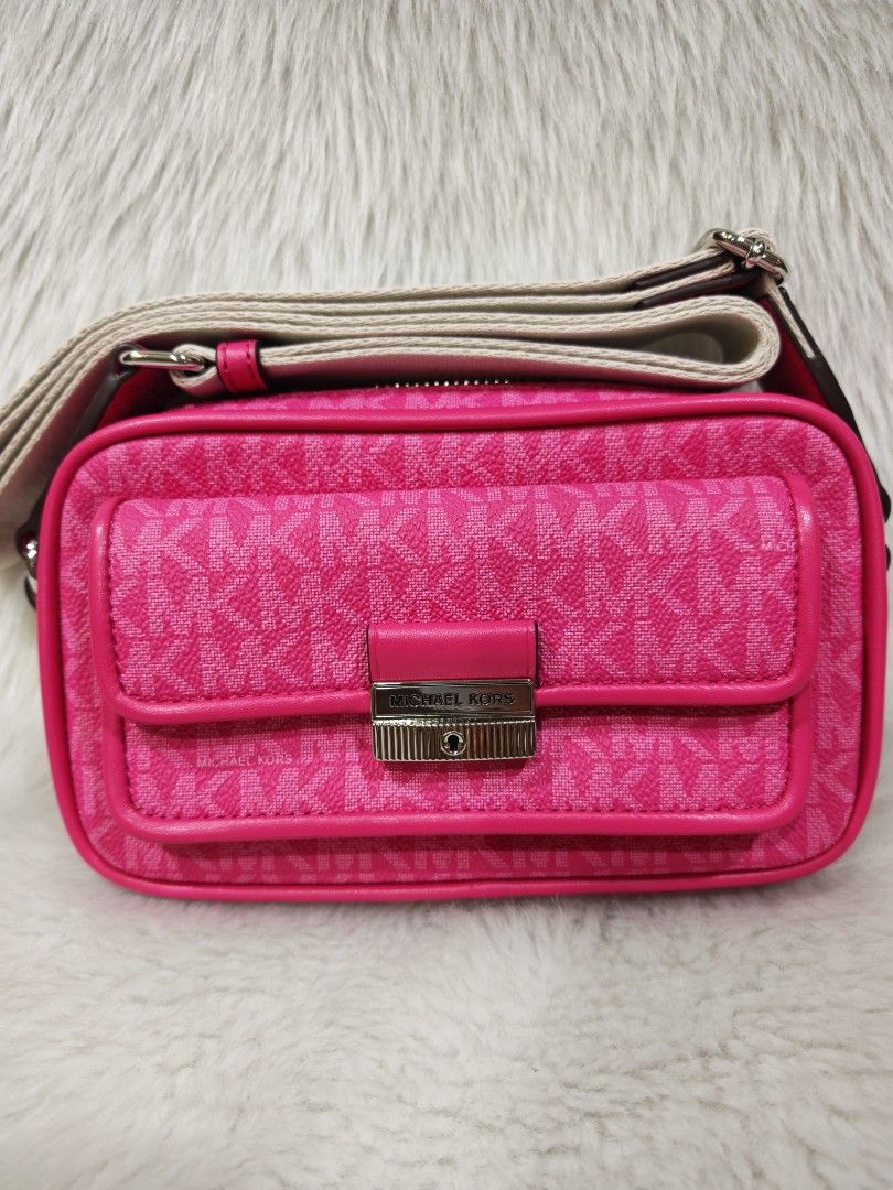 Michael Kors Bradshaw Crosdbody Bag ORIGINAL (Category: Cross-body Bags) located in Marikina City. Submitted by BrandedStuffz (Listing ID 1438096394, Image 2). Description: Dragonfruit, XS Brand New and tag and care card Guaranteed Original and Legit from MK store in USA 🇺🇸. Moneyback if proven fake. Lalamove Ready. Nationwide shipping via LBC..