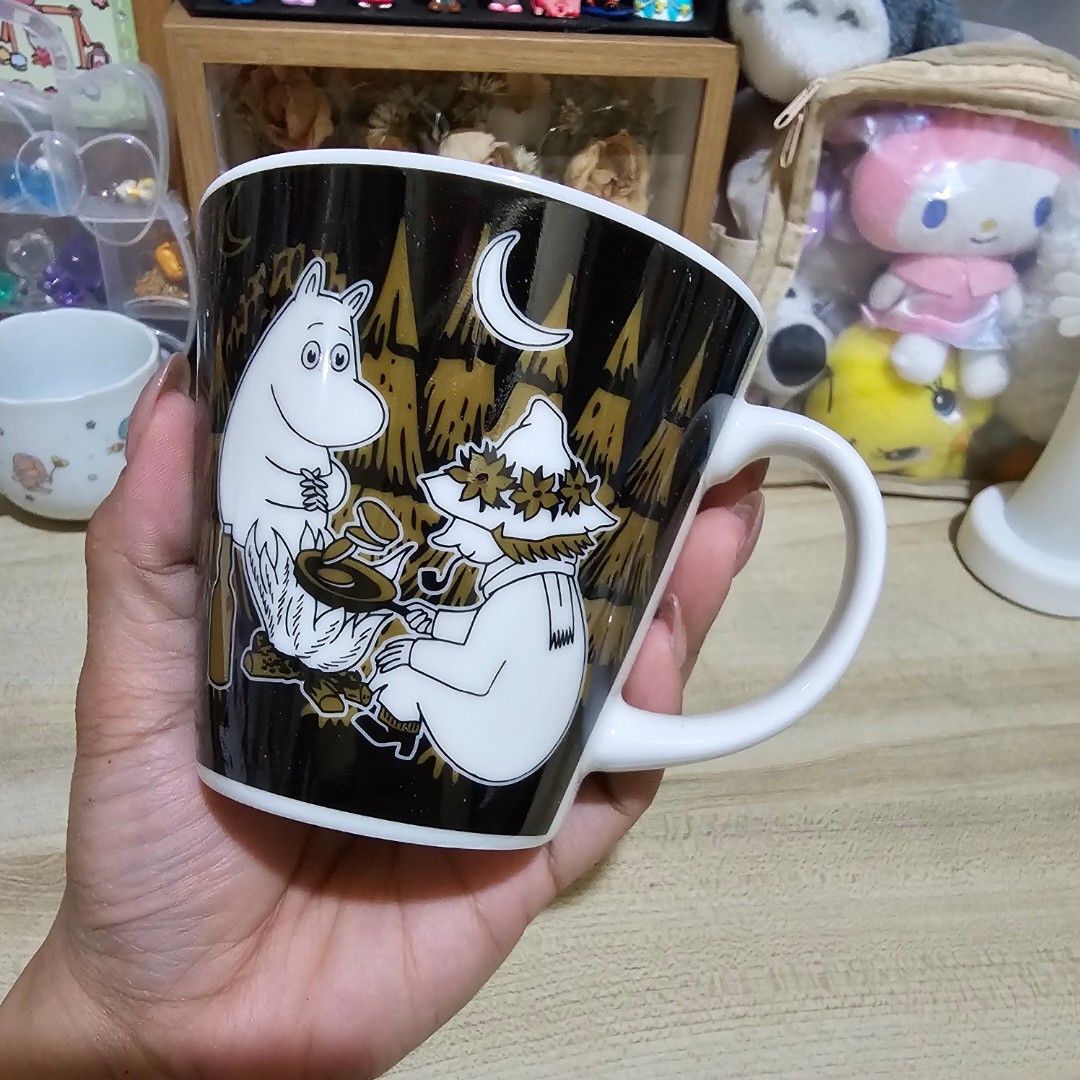 Moomin Black Mug (Category: Coffee & Tea Tableware) located in Manila. Submitted by lovelylovesjapan (Listing ID 1438093933, Image 1). Description: 🌸The item is on-hand and authentic from Japan 🌸Mode of Payment (MOP): GCASH/Bank Transfer 🌸Mode of Delivery (MOD): J&T or Lalamove (Shipping every Saturday and Sunday) Notes: 🩷Breakable items are packed with care and caution. Seller will not be held liable for any damages incurred by the courier u