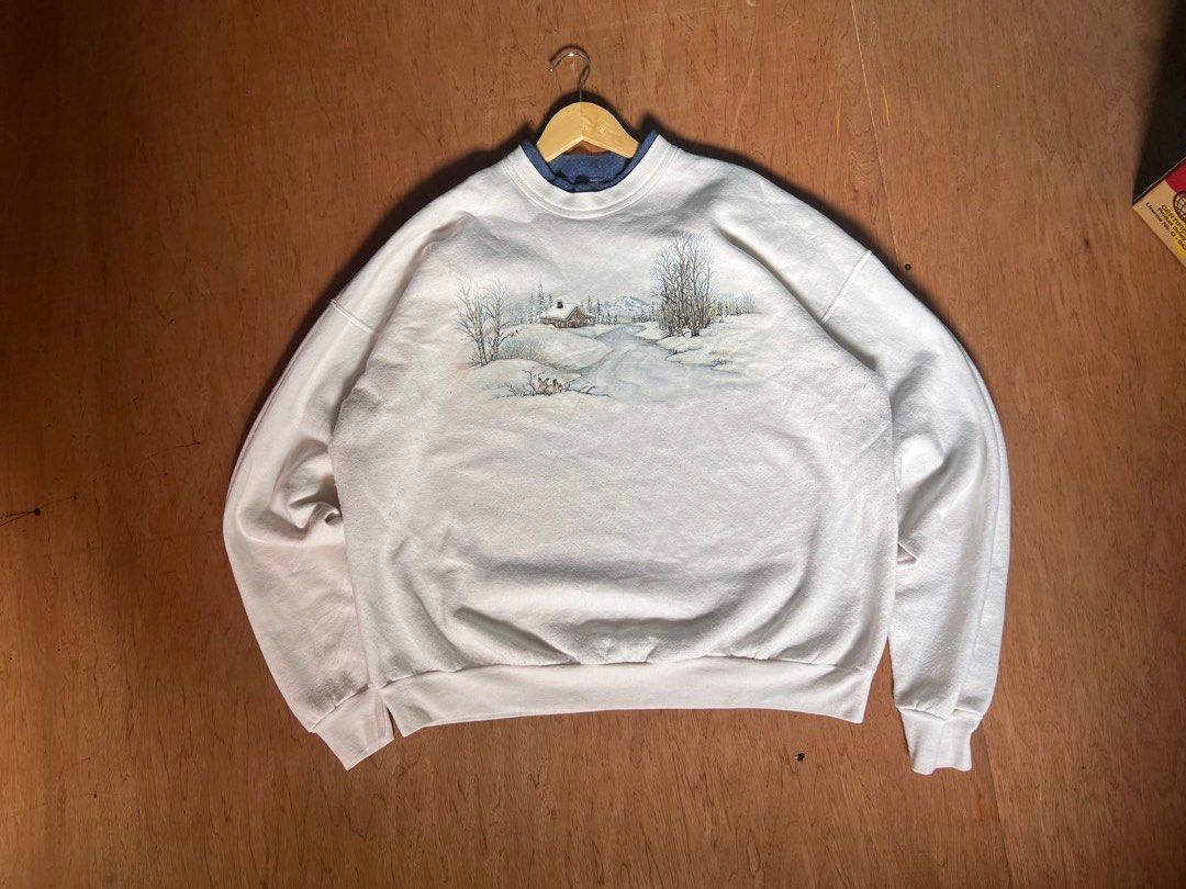 Morning Sun Winter Scene Sweatshirt (Category: Coats, Jackets and Outerwear) located in Cavite. Submitted by johnlei_ (Listing ID 1438006589, Image 1). Description: - Double-layered collar with navy blue inner layer - Graphic depicts a cabin, trees, and a snowy landscape - Ribbed cuffs on sleeves and hem - Brand: "Morning Sun" - Dimensions width:26 length: 27 -Meduim fitting .