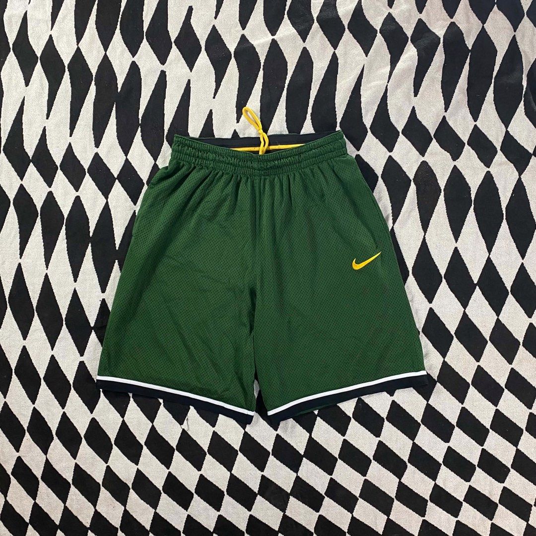 Nike Basketball Shorts Green (Category: Shorts) located in Cebu City. Submitted by theloose.thread (Listing ID 1438086449, Image 1). Description: - Green Nike basketball shorts - Yellow Nike logo on left leg - Size: Large - Features yellow drawstring and black/white trim - Made with Dri-FIT technology.