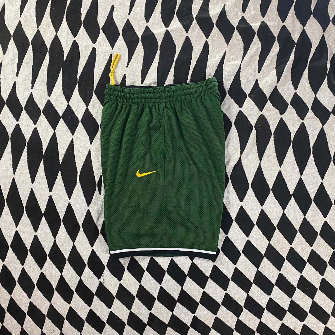 Nike Basketball Shorts Green (Category: Shorts) located in Cebu City. Submitted by theloose.thread (Listing ID 1438086449, Image 2). Description: - Green Nike basketball shorts - Yellow Nike logo on left leg - Size: Large - Features yellow drawstring and black/white trim - Made with Dri-FIT technology.