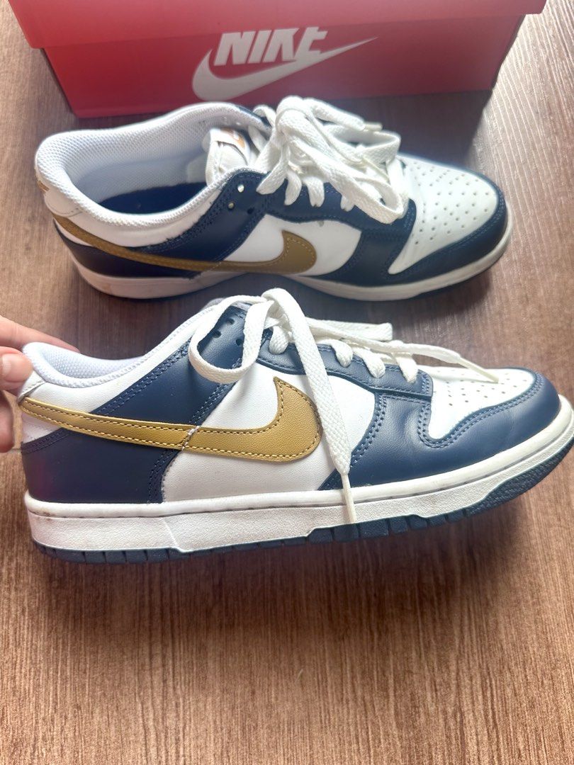 Original Nike Dunk Low GS White/Wheat-Midnight Navy (Category: Sneakers) located in Manila. Submitted by amethyste_ph (Listing ID 1438012685, Image 1). Description: Bought in footlocker - Original/ Authentic Nike Dunk Low GS - Colorway: White, Wheat, Midnight Navy - Features: White leather upper, navy blue overlays, wheat swoosh, navy outsole - Size: 6Y (UK 5.5, EUR 38.5, CM 24) - Includes original box.