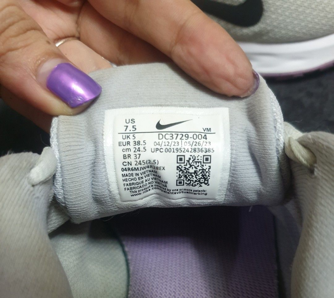 Nike Revolution 6 Gray Running Shoes (Category: Sneakers) located in Santa Maria. Submitted by anne.msb (Listing ID 1438096417, Image 2). Description: - Nike Revolution 6 running shoes - Color: Gray - Size: US 7.5, UK 5, EUR 38.5, CM 24.5 - Features: Breathable mesh upper, white sole with purple accent, black Nike swoosh rfs:declutter.