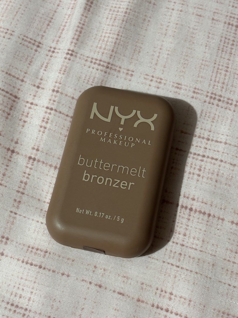 NYX Professional Makeup Butter Bronzer - Butta Biscuit (Category: Makeup) located in Manila. Submitted by mucha6ble (Listing ID 1438099913, Image 1). Description: - NYX Butter Bronzer in Butta Biscuit - Net weight: 0.17 oz / 5 g - Comes in a compact case - I bought this from iHerb .