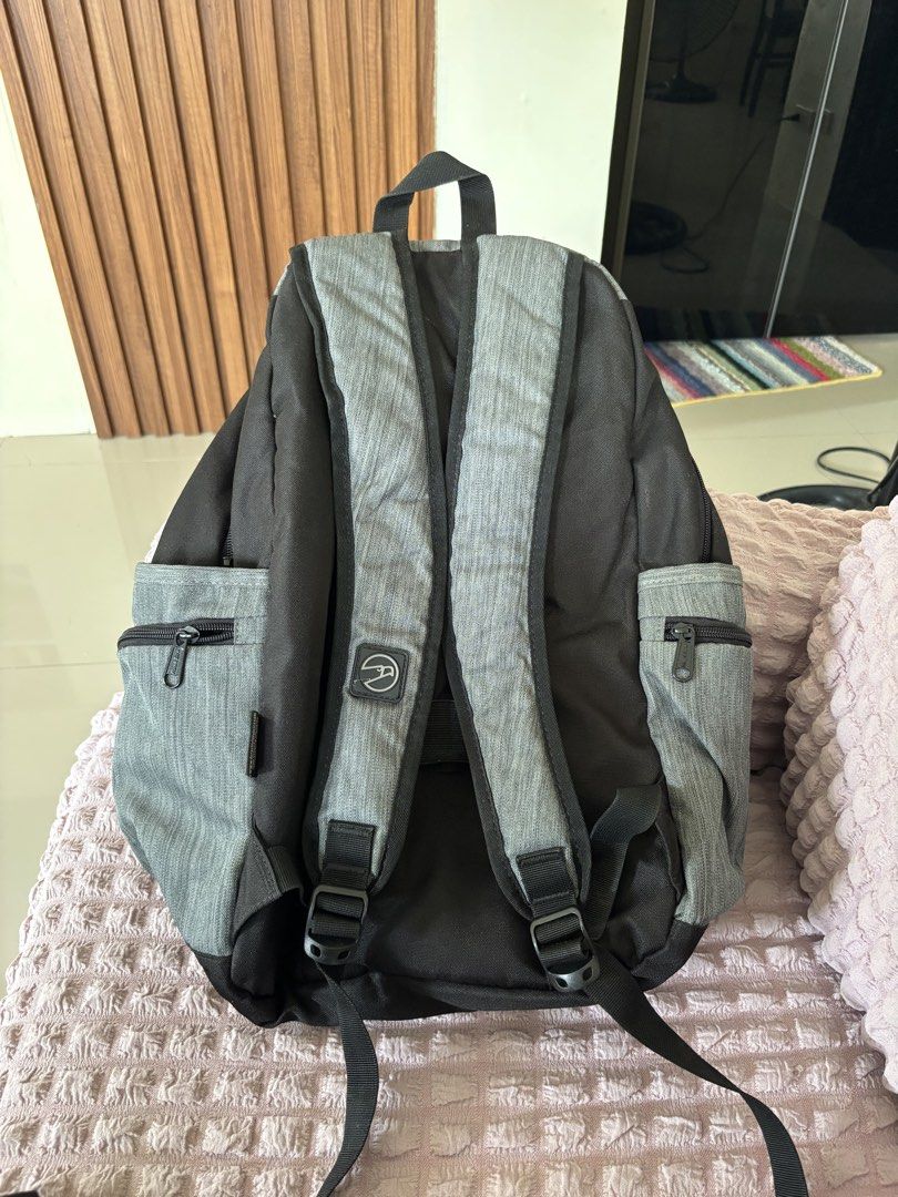 Original Hawk Backpack - Gray and Black (Category: Backpacks) located in Calauan. Submitted by amaris.boutique.ph (Listing ID 1437968794, Image 2). Description: - Hawk backpack in gray and black - Multiple zippered compartments - Side pockets - Adjustable shoulder straps - Padded back panel - Top handle - Perfect for school, work, or travel.