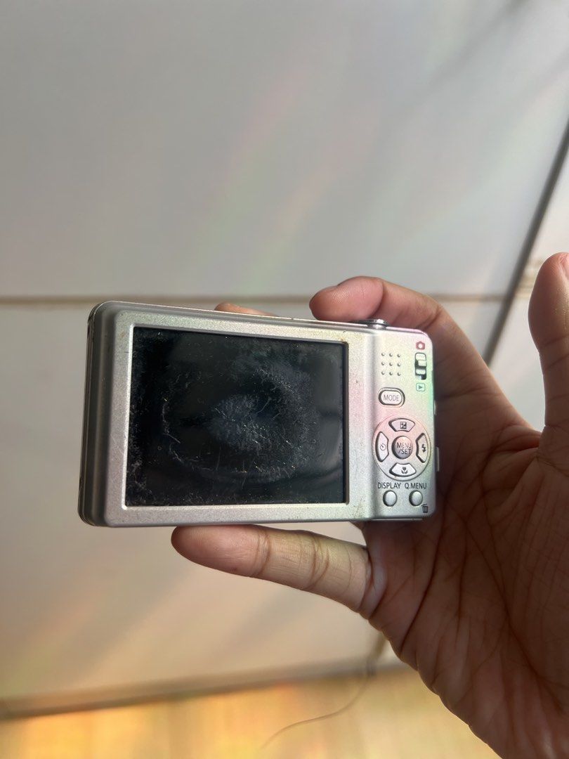Panasonic Lumix DMC-F3 (untested) (Category: Cameras) located in Manila. Submitted by rareeagle_08878d (Listing ID 1437945391, Image 2). Description: - Panasonic Lumix DMC-F3 - Silver Finish - Screen with scratches - untested - no rusting on the battery area - no batteries/charger .