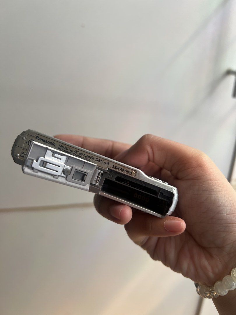 Panasonic Lumix DMC-F3 (untested) (Category: Cameras) located in Manila. Submitted by rareeagle_08878d (Listing ID 1437945391, Image 3). Description: - Panasonic Lumix DMC-F3 - Silver Finish - Screen with scratches - untested - no rusting on the battery area - no batteries/charger .