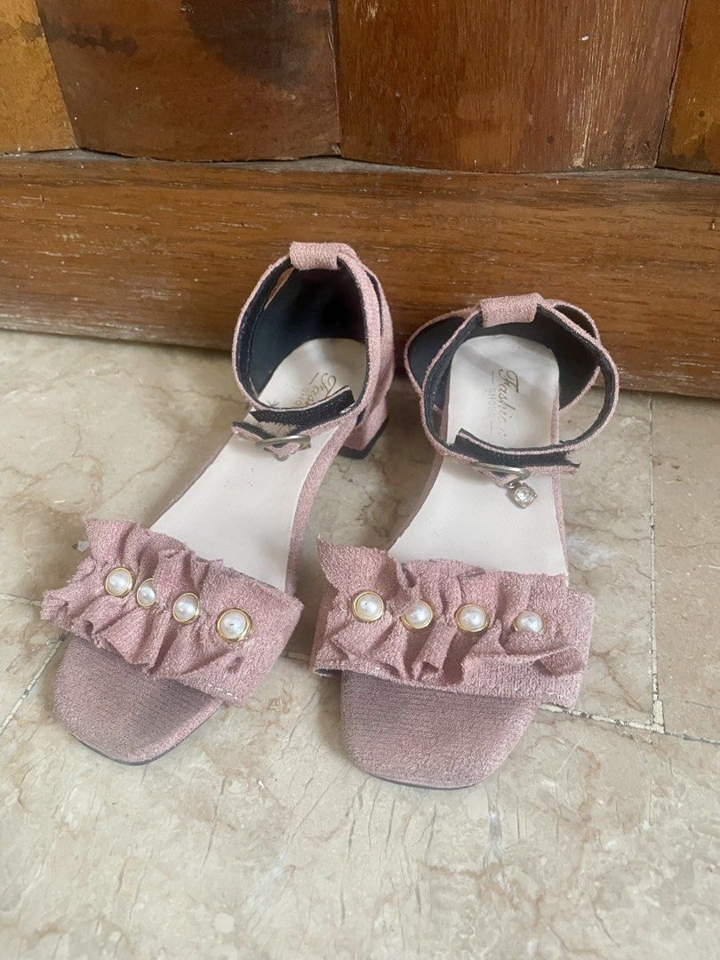 Pink Suede Ruffled Strap Sandals for Kids (Category: Flats & Sandals) located in Quezon City. Submitted by mixeditemsforsale (Listing ID 1438095599, Image 1). Description: - Pink sandals - Ruffled strap design with pearl accents - Block heel - Ankle strap with buckle closure - Size 31 - Adds elegance to any outfit.