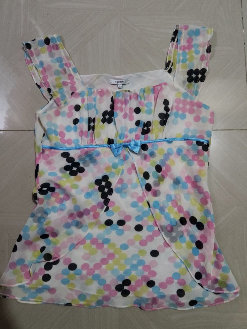 Polka Dot Whimsy Blouse Top (Category: Blouses) located in Zamboanga. Submitted by earthlywisteria (Listing ID 1438044288, Image 1). Description: - very whimsical y2k polka dot blouse - mesh type of fabric with inner lining - size m loc: zc, mindanao.
