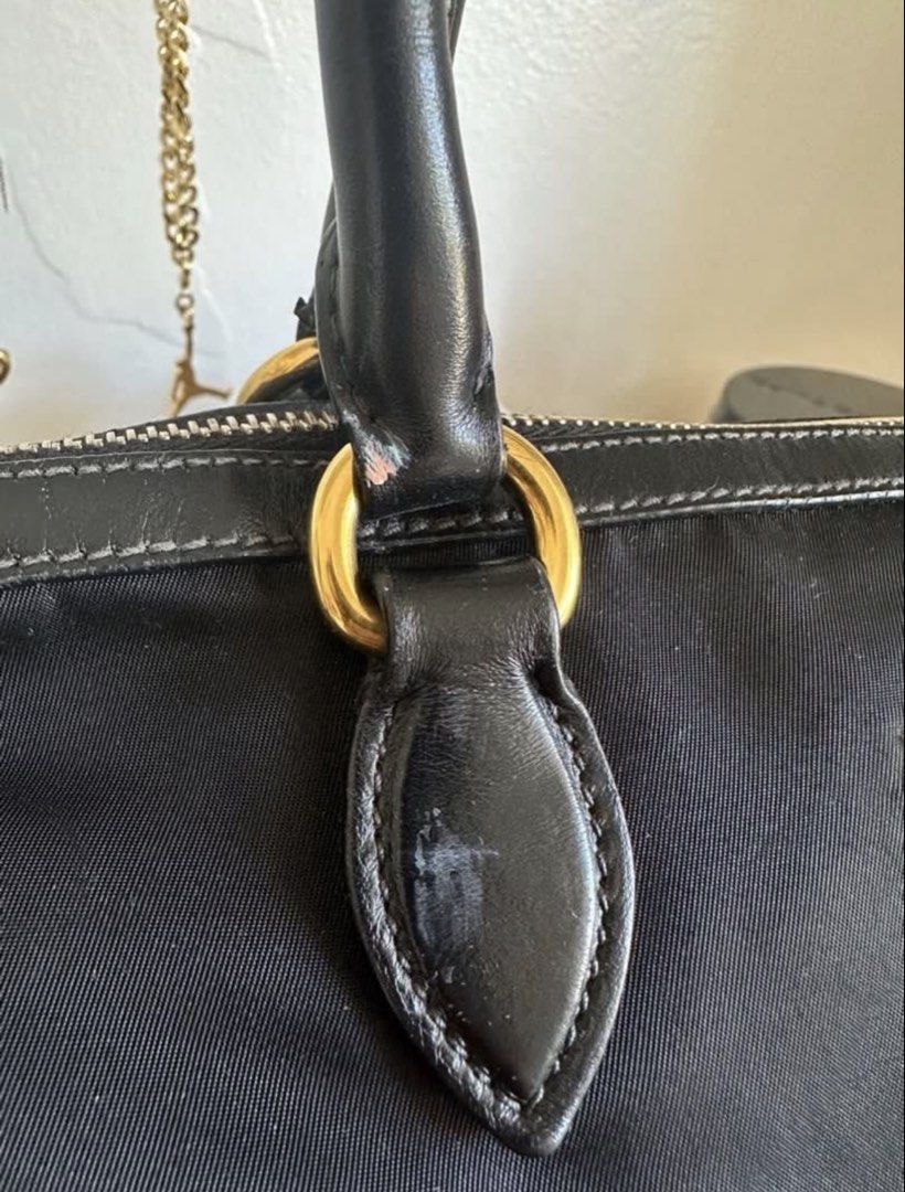 Prada Tessuto Soft CA Nero Handbag (Category: Luxury Bags & Wallets) located in Cabuyao City. Submitted by HelloSunshineDeclutters (Listing ID 1437994753, Image 3). Description: - Authentic Prada handbag - Black Tessuto fabric - Gold-tone hardware - Detachable shoulder strap Prada 1BA104 Color: Nero In good used condition, scratchmarks on the hardware Few cracks on the handle Needs a little cleaning, still very nice when worn/carried Interior is 