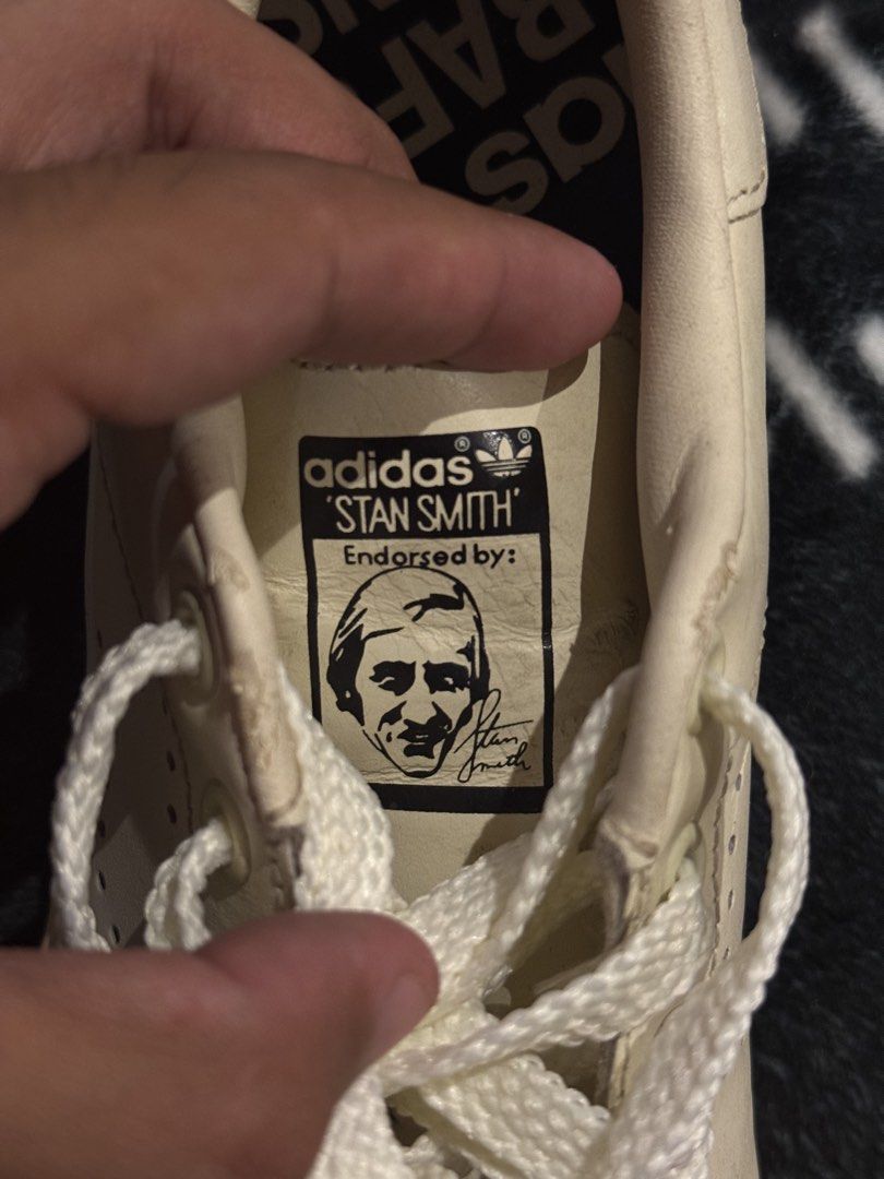 Raf Simons x Adidas Stan Smith "Archive" (2019 Pack) Chalk White (Category: Sneakers) located in Quezon City. Submitted by 4pril9 (Listing ID 1437996543, Image 3). Description: A collector’s piece for fans of Raf’s archival work. Features the “1995” launch tribute text on the rear quarter. Used less than 10 times and kept in great condition. Condition: 8/10. Very clean uppers; super slight heel drag as shown in photos. Size: US 5 (Rare small size