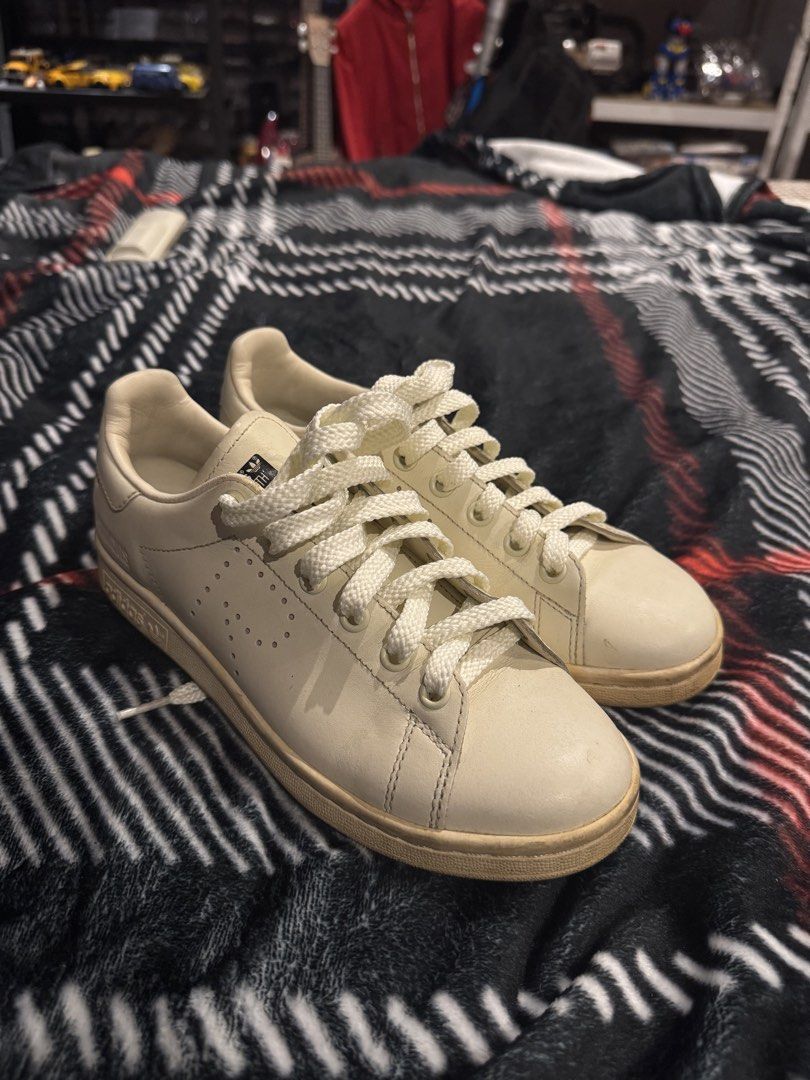 Raf Simons x Adidas Stan Smith "Archive" (2019 Pack) Chalk White (Category: Sneakers) located in Quezon City. Submitted by 4pril9 (Listing ID 1437996543, Image 1). Description: A collector’s piece for fans of Raf’s archival work. Features the “1995” launch tribute text on the rear quarter. Used less than 10 times and kept in great condition. Condition: 8/10. Very clean uppers; super slight heel drag as shown in photos. Size: US 5 (Rare small size