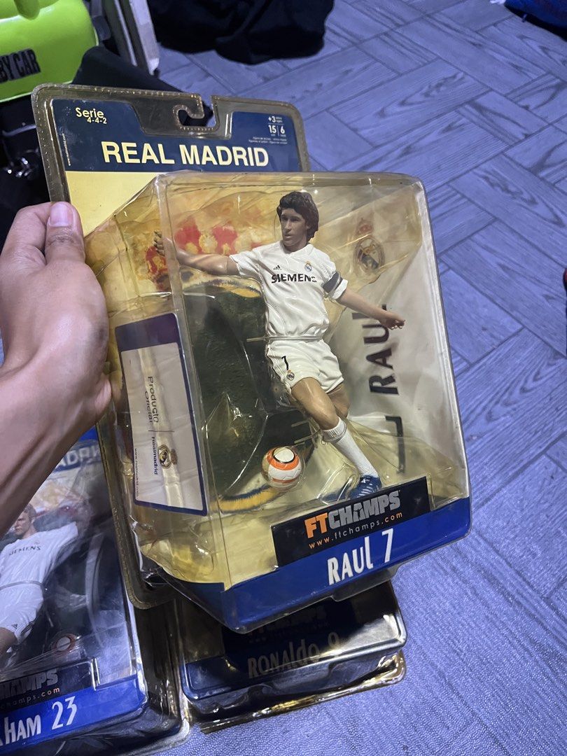 Real Madrid Raul 7 FT Champs Action Figure (Category: Toys & Games) located in Paranaque City. Submitted by alasthrift26 (Listing ID 1438078118, Image 1). Description: - Collectible Raul #7 Real Madrid action figure - Manufactured by FT Champs - Figure is in original packaging - Features Real Madrid logo on packaging - Includes FT Champs logo - Raul is in his Real Madrid kit.