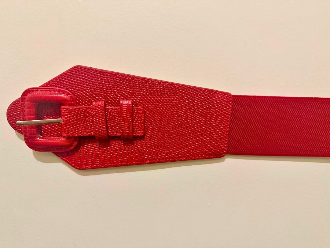 Red Wide Belt with Buckle (Category: Belts) located in Caloocan City. Submitted by jay-jay_fembox101 (Listing ID 1438106408, Image 2). Description: - Wide red belt - Textured surface - Rectangular buckle with gold-colored pin - Flexible, possibly elastic material - Comfortable fit - Adds a pop of color to any outfit - Ideal for high-waisted look.