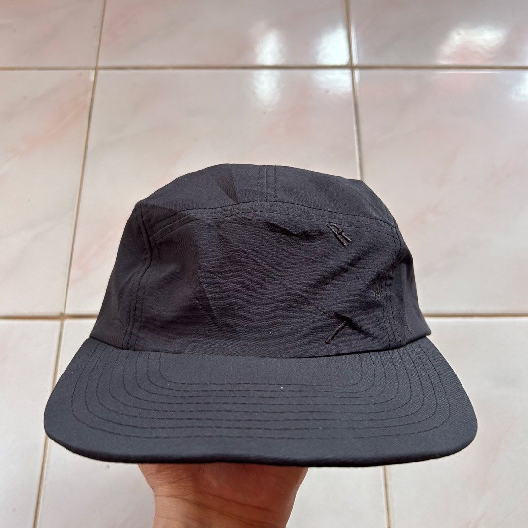 REMIX TAIPEI Black Cap 🔥 (Category: Caps & Hats) located in Jinoba-an. Submitted by eegiboy (Listing ID 1438026324, Image 1). Description: - Black cap from REMIX TAIPEI. - Curved brim. - Adjustable strap. - Small logo detail. - Features a tag with the text: "REALITY IS WRONG. DREAMS ARE FOR REAL." - Includes a label with coordinates and the text: "IF LOST PLEASE RETURN TO THIS COORDINATES". 550plussf Dm me if interested Thankyou.