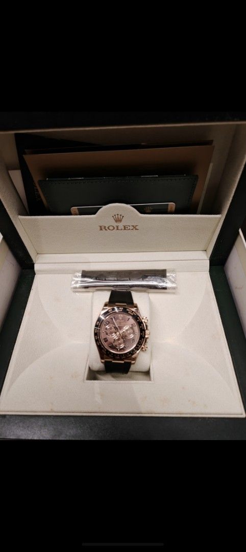 Rolex Daytona 116515LN (APH Dial) (Category: Watches) located in Singapore. Submitted by goodoldrollie (Listing ID 1437977786, Image 1). Description: Rare APH Dial Rolex Daytona - Rolex Oyster Perpetual 116515LN - Comes with original box and papers - Year: May 2013 - Minimal signs of wear - Full stickers on - Leather strap is unworn, currently on Rubber B - Perfect for collectors No lowballers. .